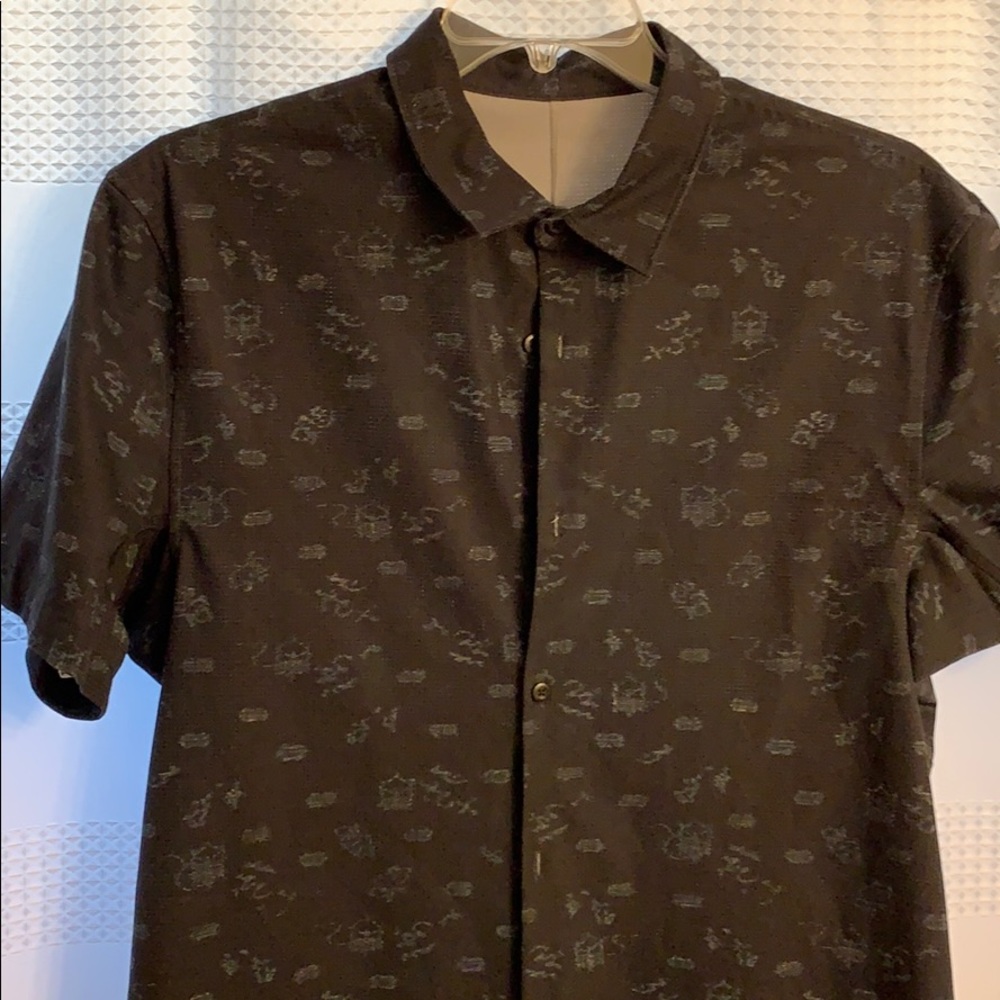 Black button down shirtsleeve